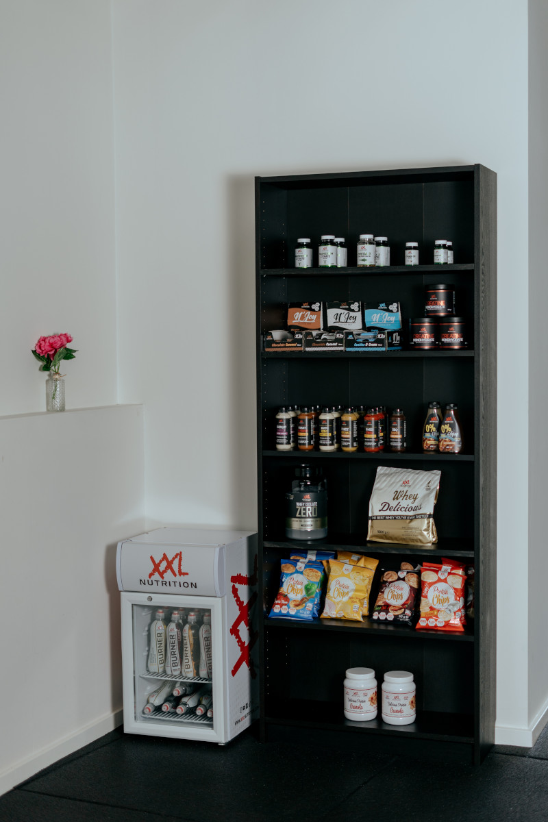 Foto van XXL Nutrition producten op display